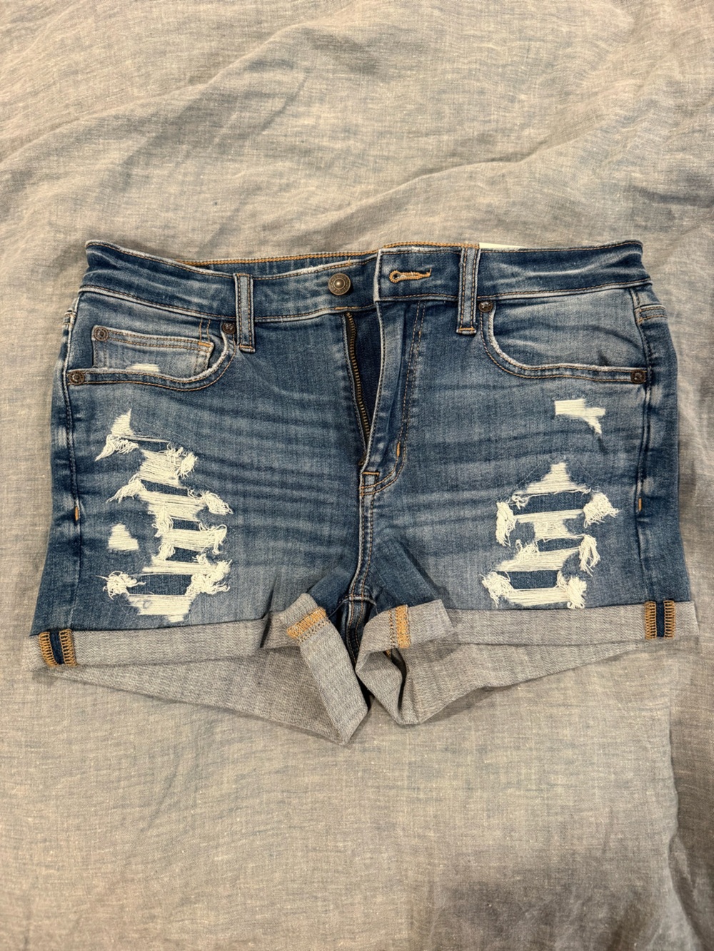 American Eagle Outfitters Distressed Blue Denim Roll‑Cuff Shorts